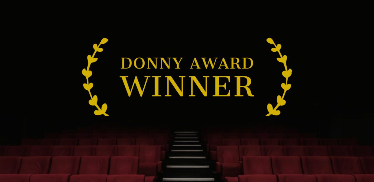 empty theatre with Donny Award Winner laurel superimposed